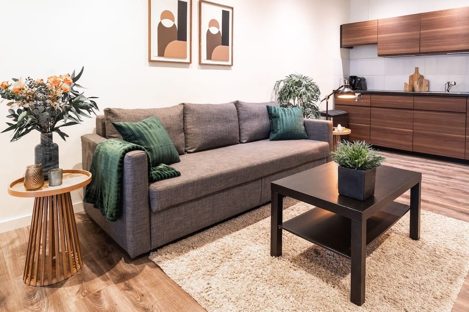 Seating area with TV and coffee table.
