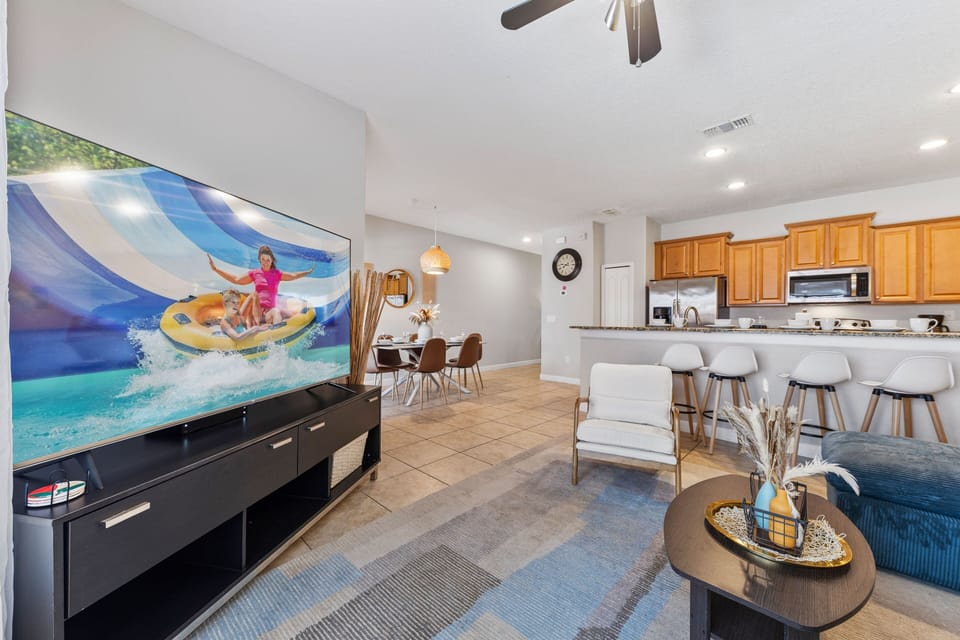 Stunning living area with Smart TV and spacious
