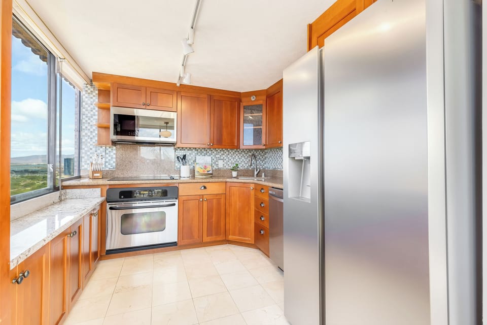 A bright and open kitchen offering panoramic views