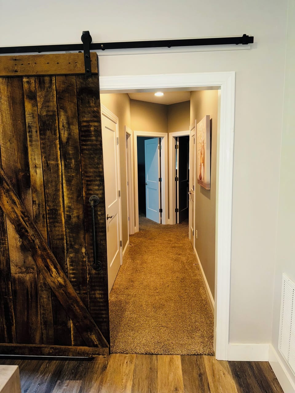 Hallway to 2 king bedrooms