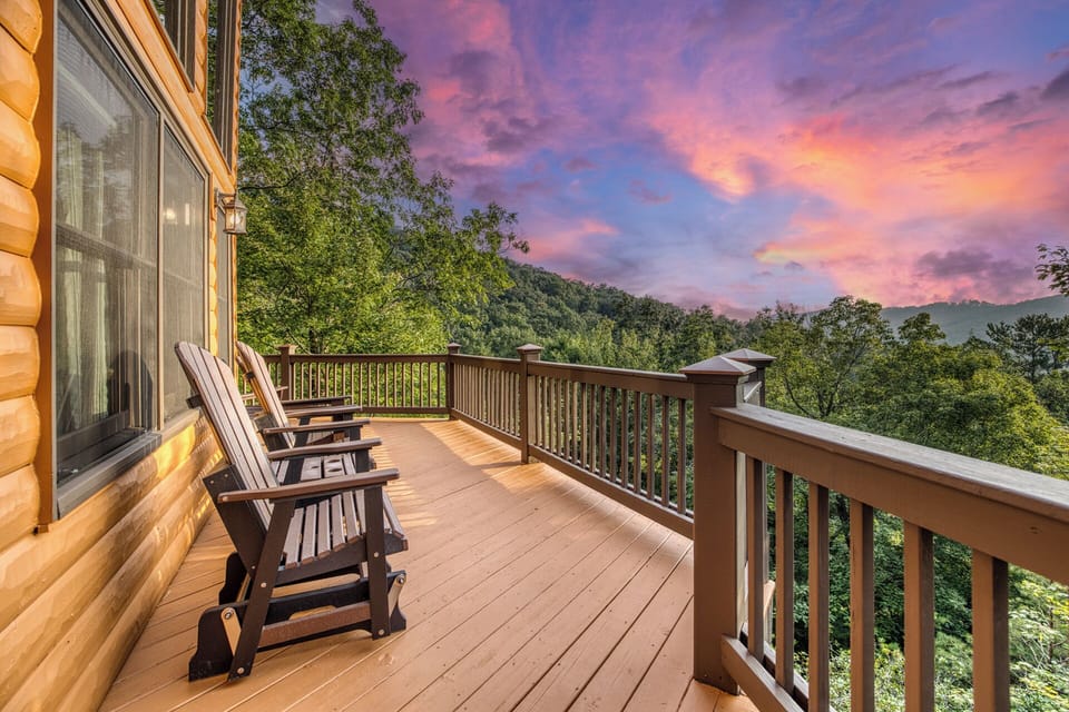 Unwind in a wraparound deck w/ stunning mountain views.