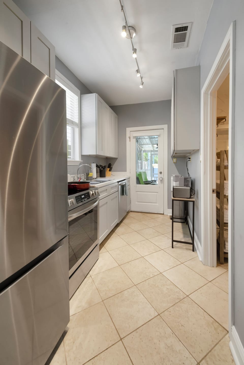 Kitchen- stainless steel appliances, coffee and coffee supplies, cookware, soap