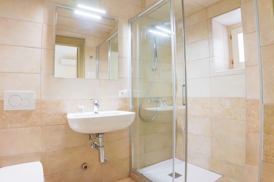 Bathroom | Shower, hair dryer, towels, soap