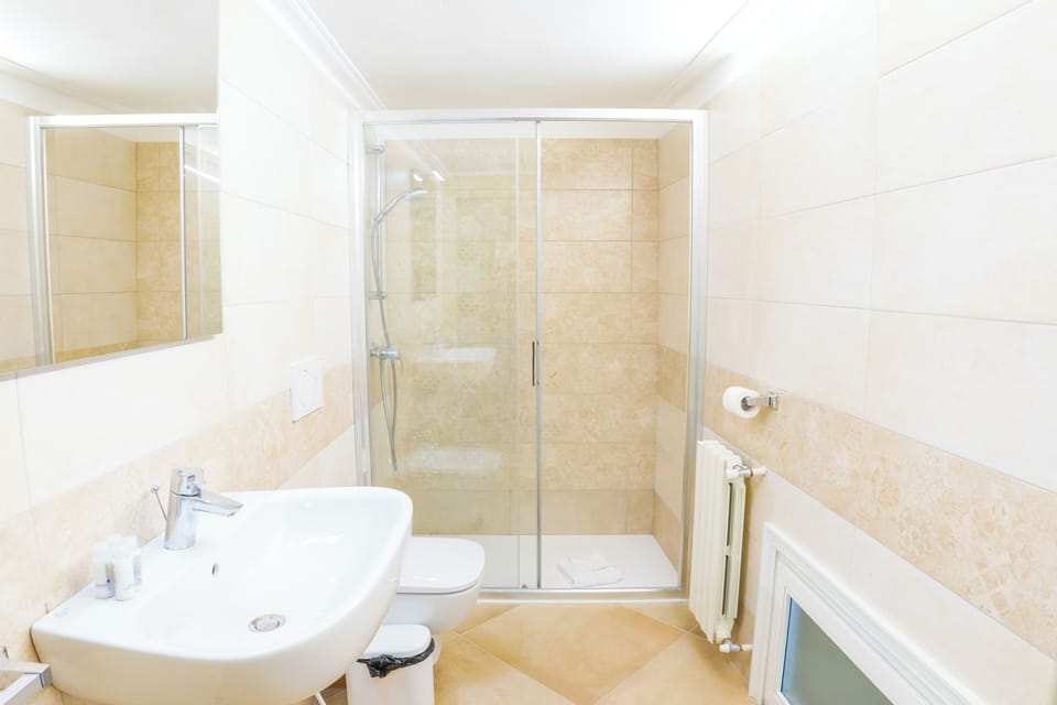 Bathroom | Shower, hair dryer, towels, soap