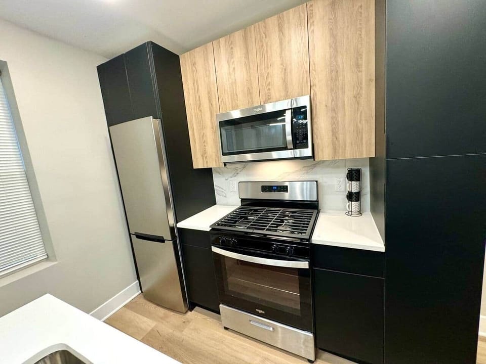 Brand new kitchen and appliances with breakfast bar, dishwasher ,microwave, refrigerator. 
Joined with the living room with  sofa bed, large flat screen tv , And fireplace.