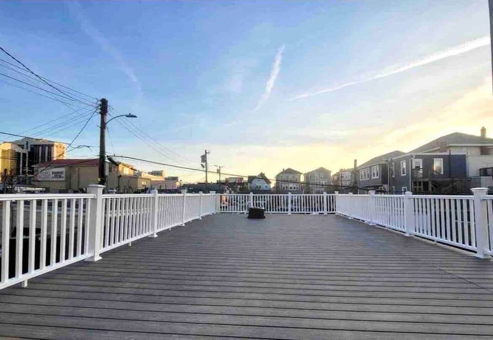 Big beautiful shared deck for outdoor dining or just relax and enjoy the beautiful weather or sunset.