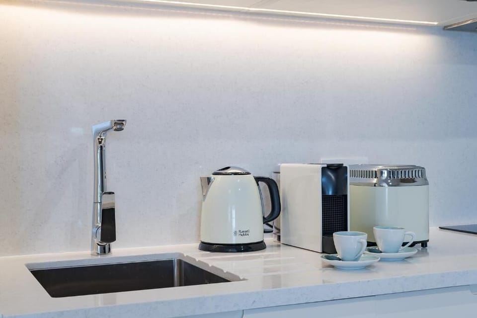 Espresso maker, fridge, microwave, oven