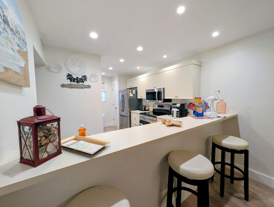 Open kitchen and bar area perfect for gatherings