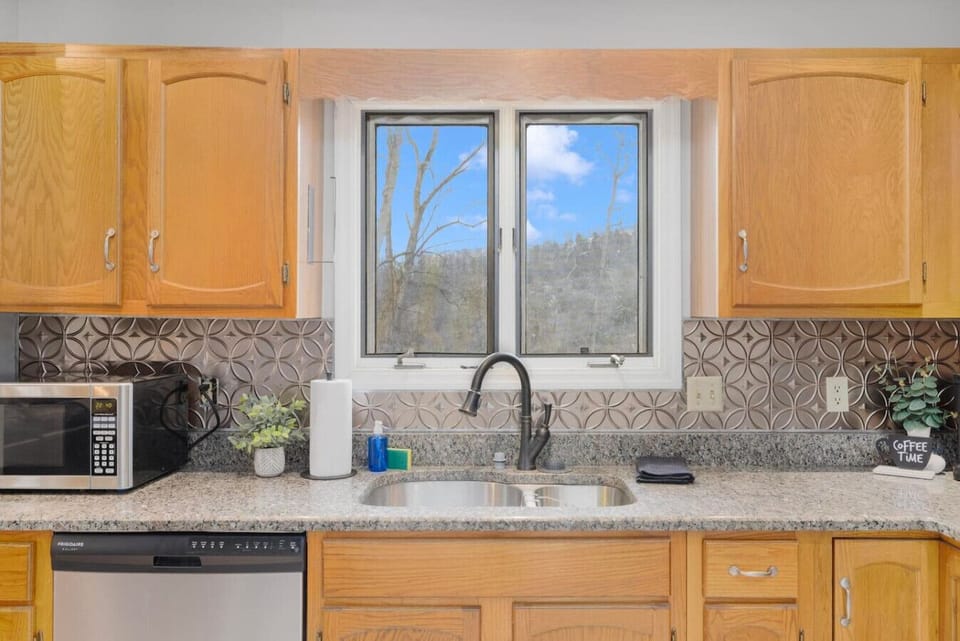 Enjoy views of the cliffs behind the house from all the rear facing windows