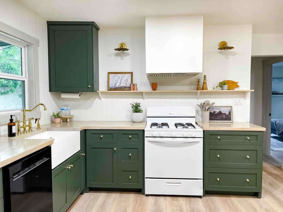 Fully equipped kitchen with toaster, dishwasher, farm sink, stove, oven, pots, pans & basic cooking utensils 