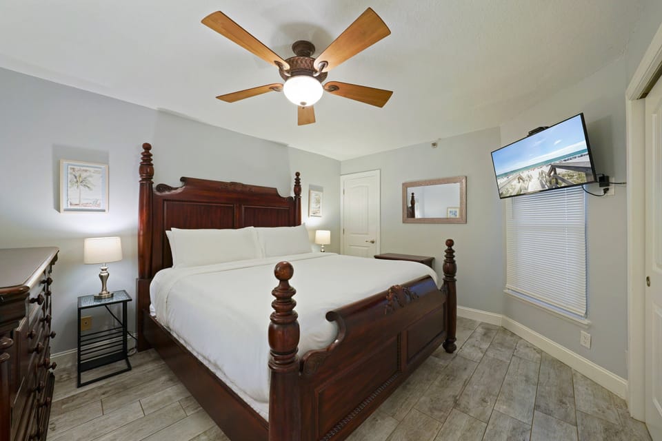 Wake refreshed in this beautifully appointed bedroom in Destin, designed for relaxation and restful nights near the Gulf.