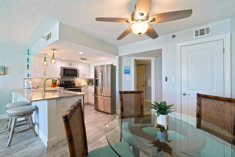 Designed for gathering and memory-making, this inviting coastal interior keeps the Gulf front and center