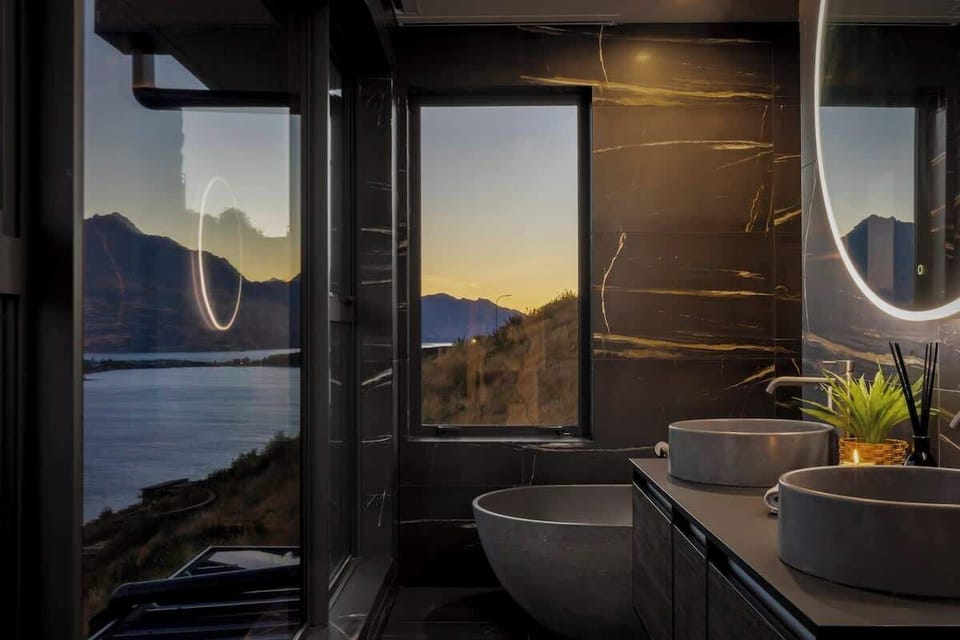 Master bedroom ensuite with bath tub.
Soak in the freestanding tub as mountain views spill through the window. Every detail is designed for relaxation and indulgence.