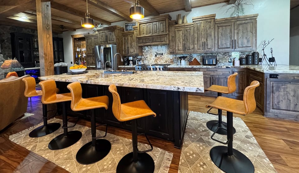 Perfect kitchen setting w/ plenty of space for food prep and sitting around