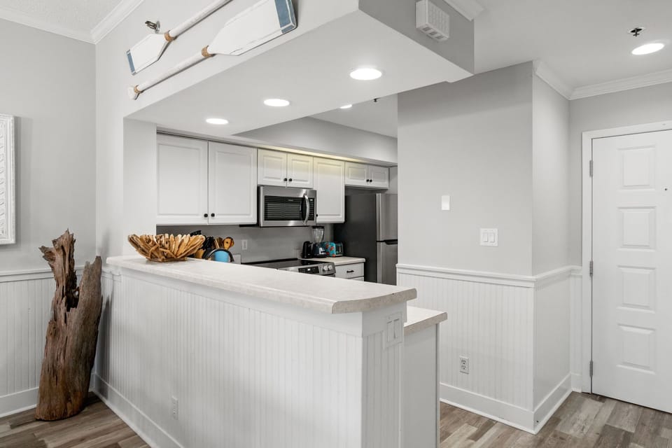Bright kitchen for quick bites before beach adventures.