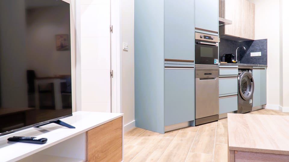 Standard Apartment | Living area | 32-inch Smart TV with digital channels