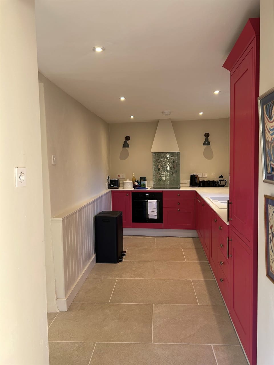 The Kitchen has an Induction hob, large Fridge freezer, dishwasher and washing machine