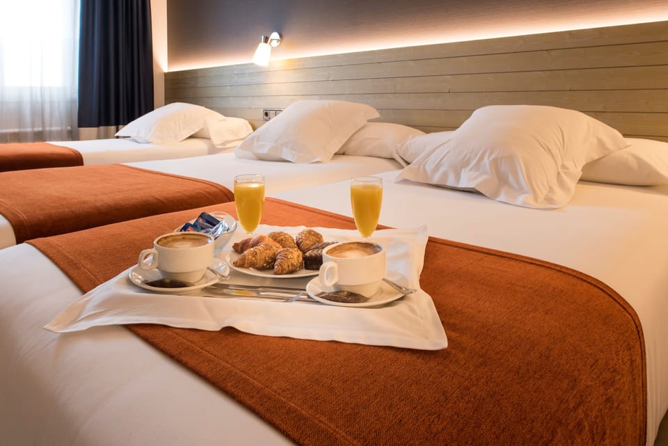 Triple Room | Egyptian cotton sheets, premium bedding, down comforters