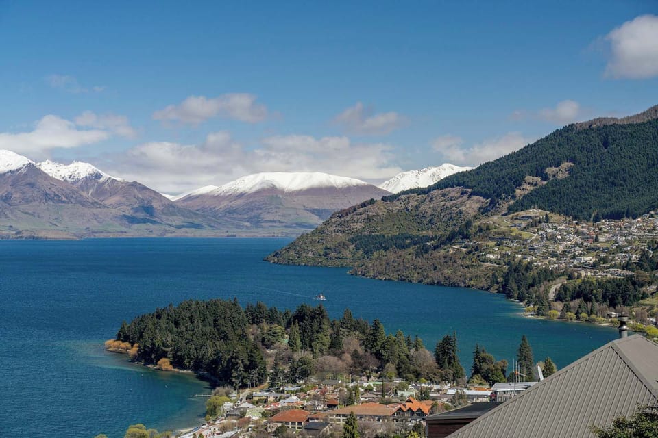 Expansive lake and mountain scenery.