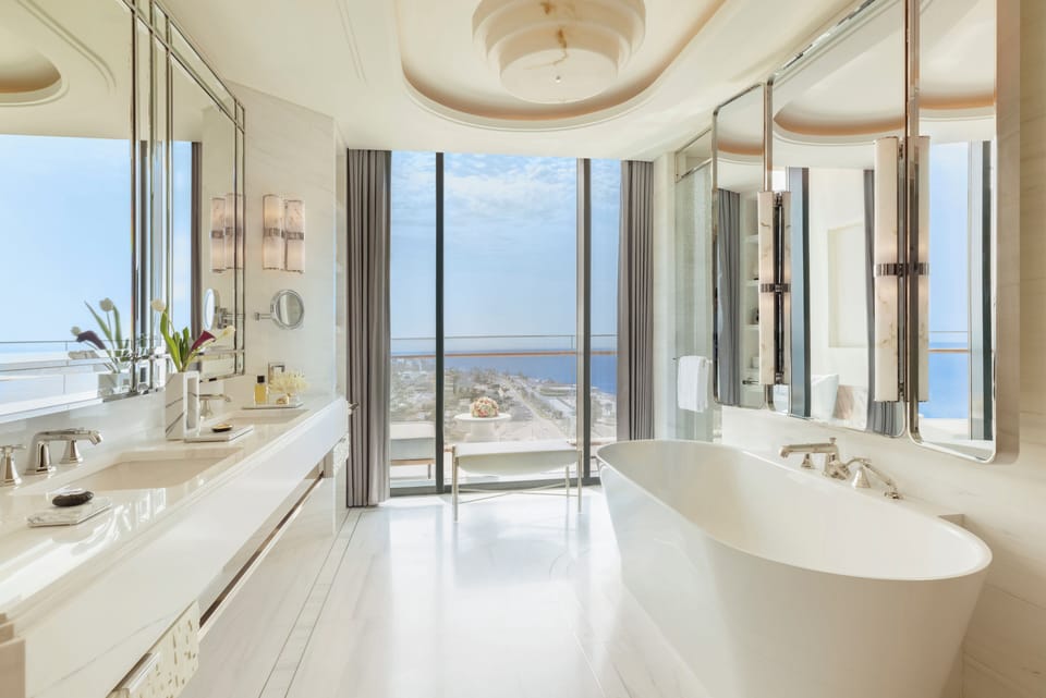 Separate tub and shower, rainfall showerhead, eco-friendly toiletries