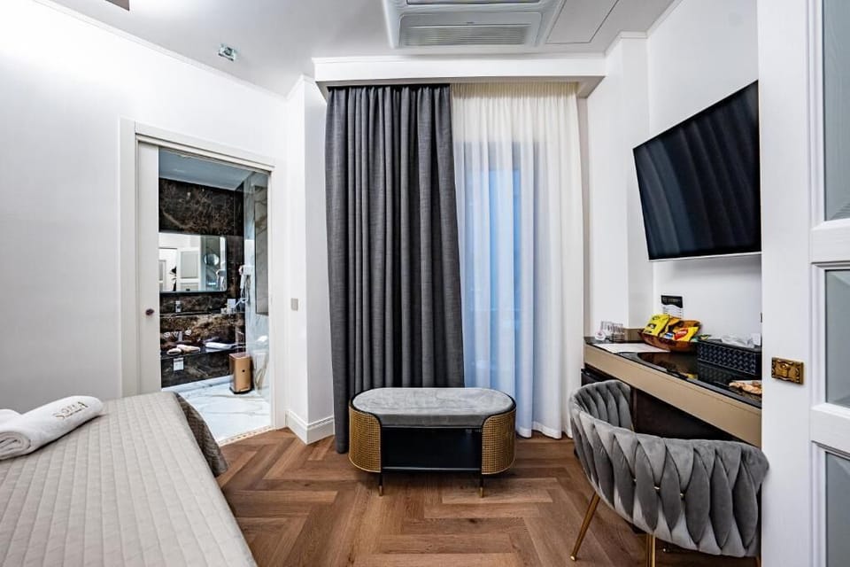 Comfort Double Room, Balcony, Courtyard View | In-room safe, blackout drapes, soundproofing, iron/ironing board