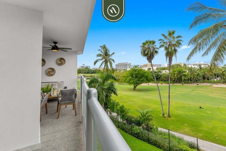Enjoy breathtaking views of the manicured green fairways and palm trees directly from your private balcony. A serene backdrop for your morning coffee.