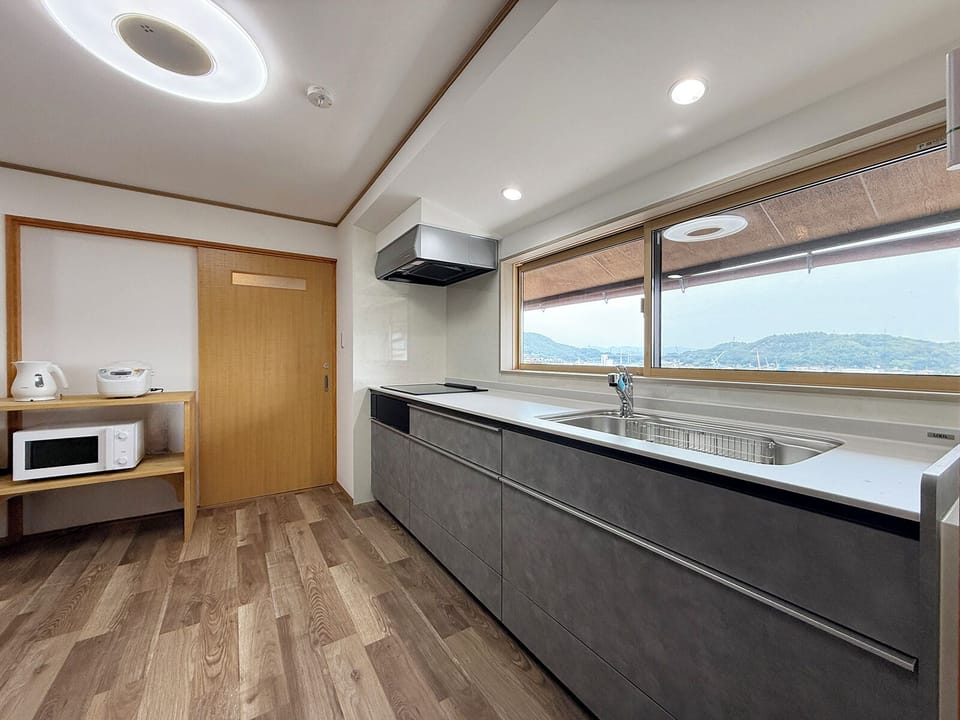 Panoramic House, Balcony, Hill View | Private kitchen | Electric kettle