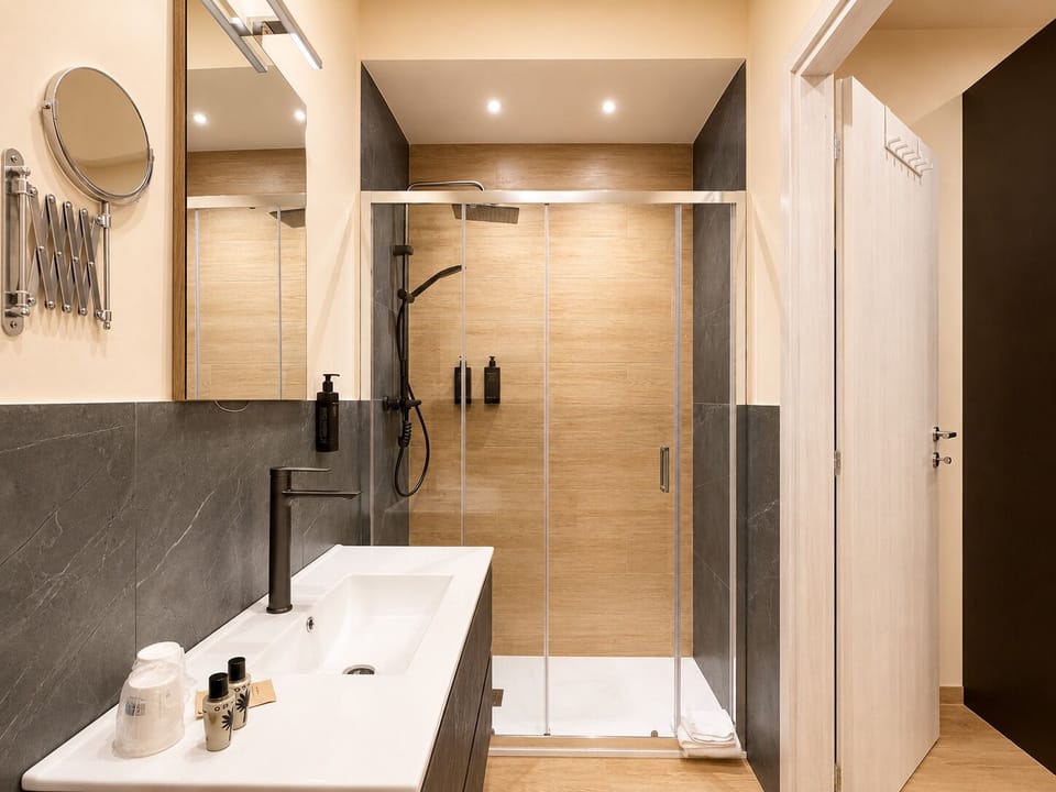 Shower, rainfall showerhead, eco-friendly toiletries, hair dryer