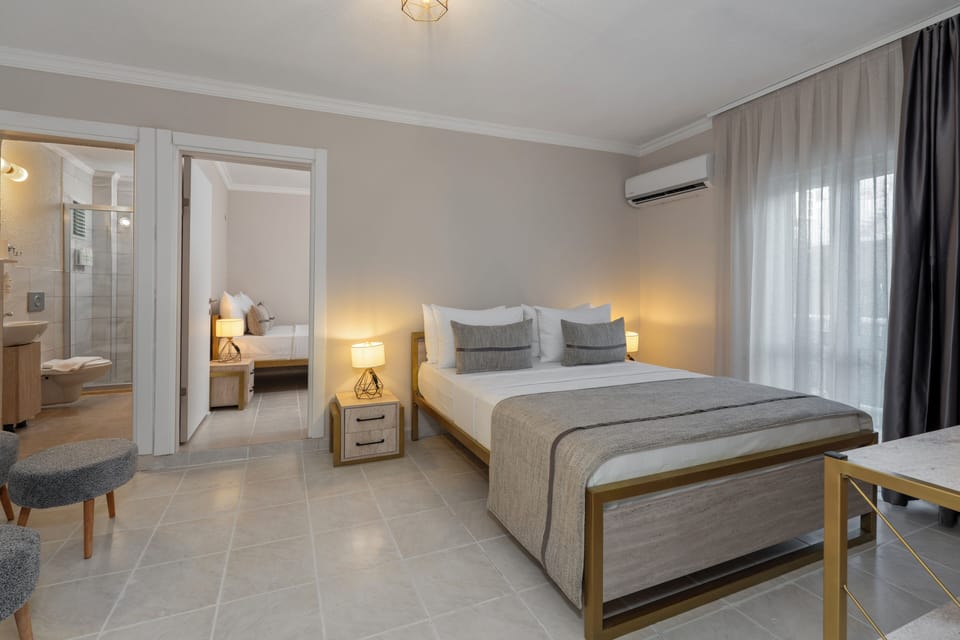 Family Room, 2 Bedrooms | Premium bedding, minibar, free WiFi, bed sheets