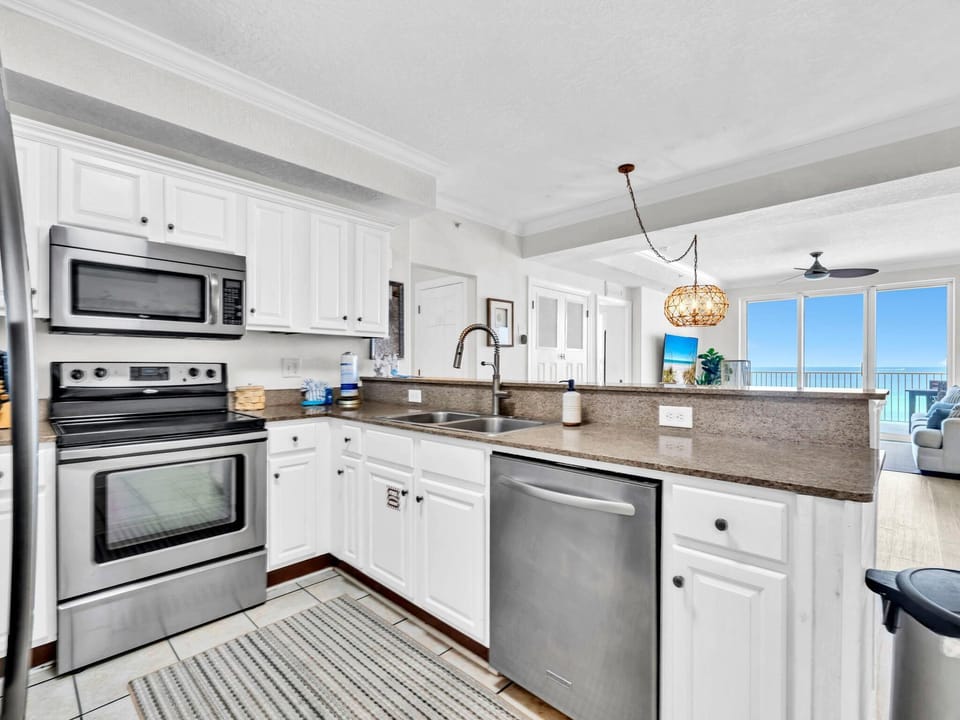 Condo, Multiple Beds (Tropic Winds 503) | Private kitchen | Oven, toaster