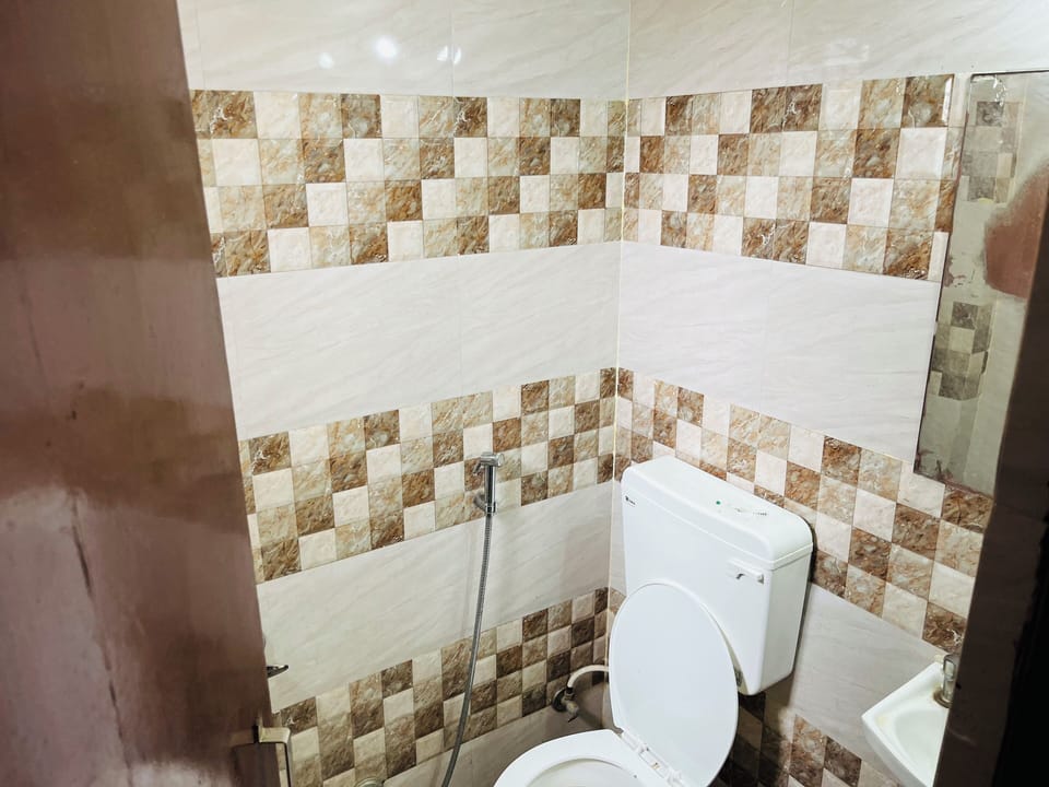 Deluxe Room | Bathroom | Shower, towels
