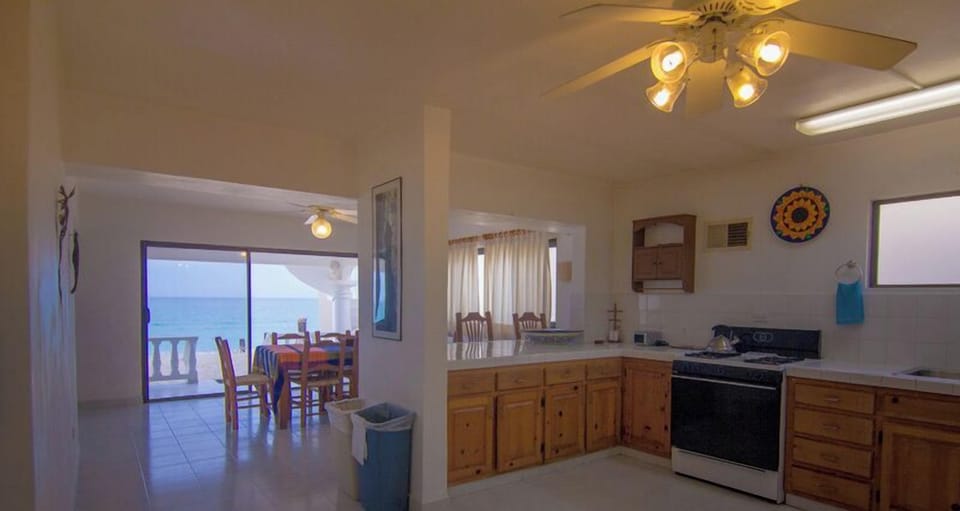 House, Multiple Beds, Patio, Beach View (E-10.5) | Private kitchen | Dining tables