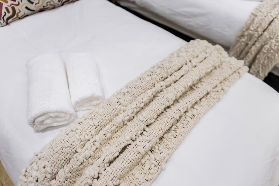 A serene and welcoming space that balances relaxation and playful energy.