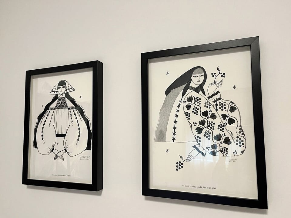 Even the hallway offers visual delight, with modern monochrome illustrations that reflect the minimalist aesthetic of the entire home.