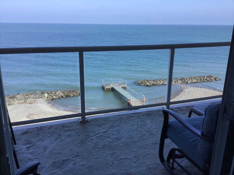 Private beach has fishing pier for guests
