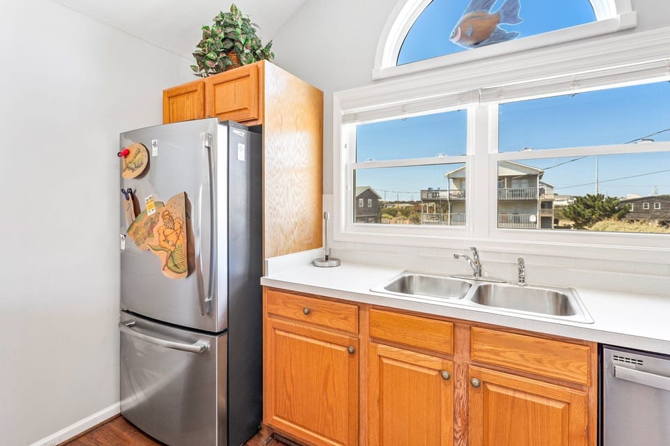Kitchen: Whip up vacation favorites in the fully stocked kitchen with a convenient breakfast bar.