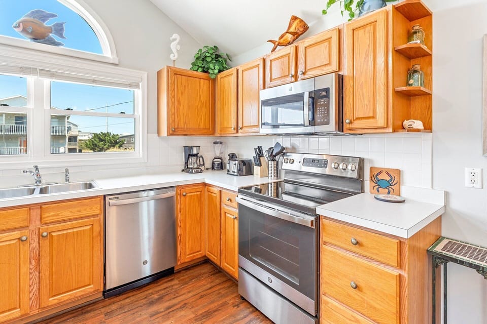 Kitchen: Whip up vacation favorites in the fully stocked kitchen with a convenient breakfast bar.
