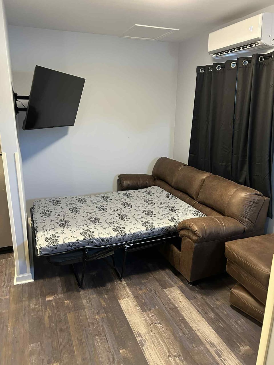 The full sized sofa couch. It comes with a 2in mattress topper and bedding.
