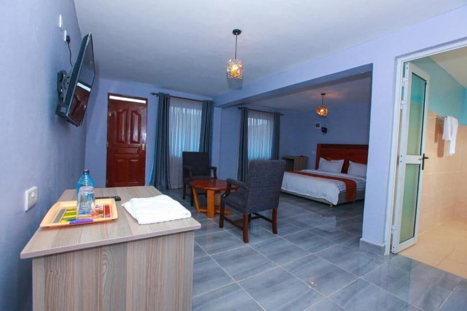 Family Quadruple Room, Garden View | Free WiFi, bed sheets