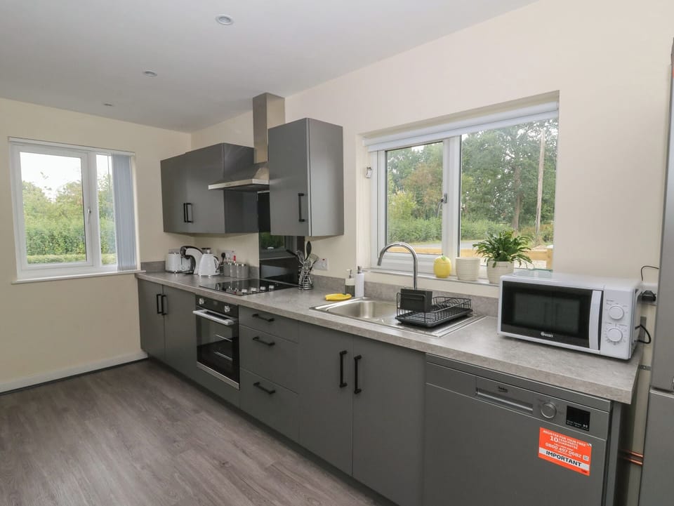 Microwave, dishwasher, toaster, cookware/dishes/utensils