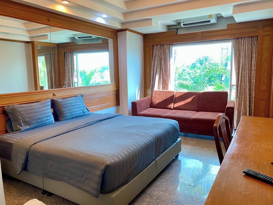 Deluxe Double Room, Pool View | Desk, free WiFi, bed sheets