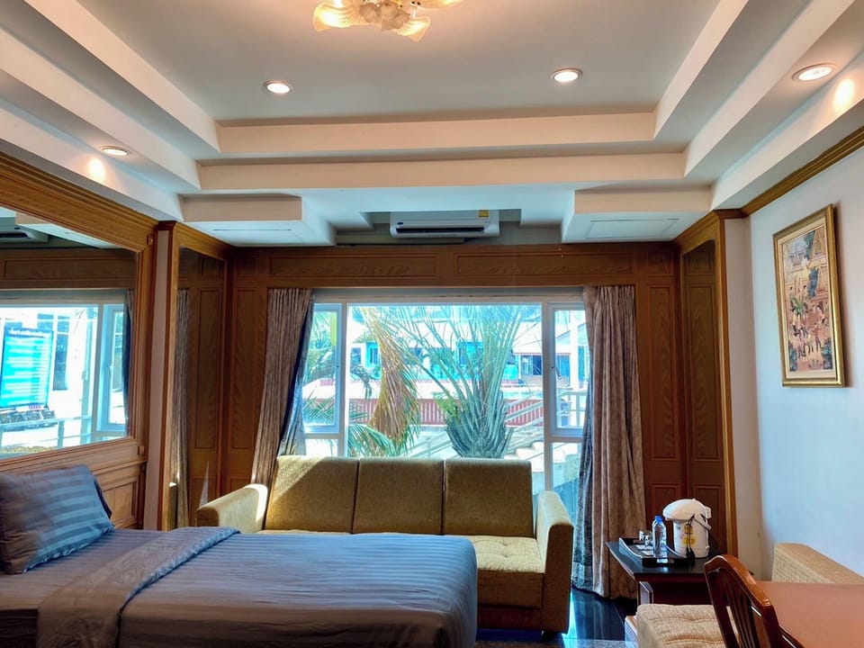 Deluxe Twin Room, Pool View | Desk, free WiFi, bed sheets