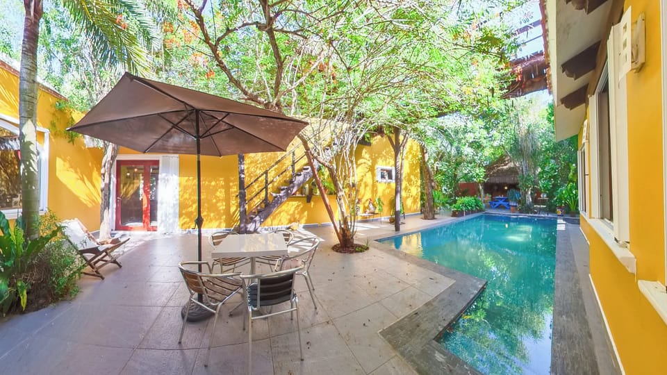 Outdoor pool, pool umbrellas, sun loungers
