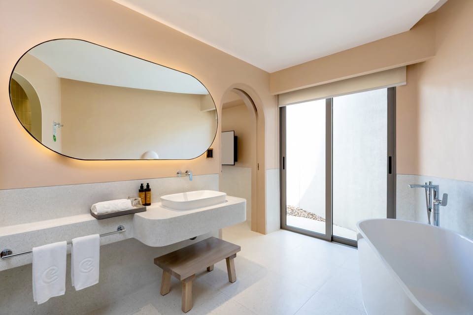 Villa, 1 Bedroom (Private) | Bathroom | Separate tub and shower, free toiletries, hair dryer, bathrobes