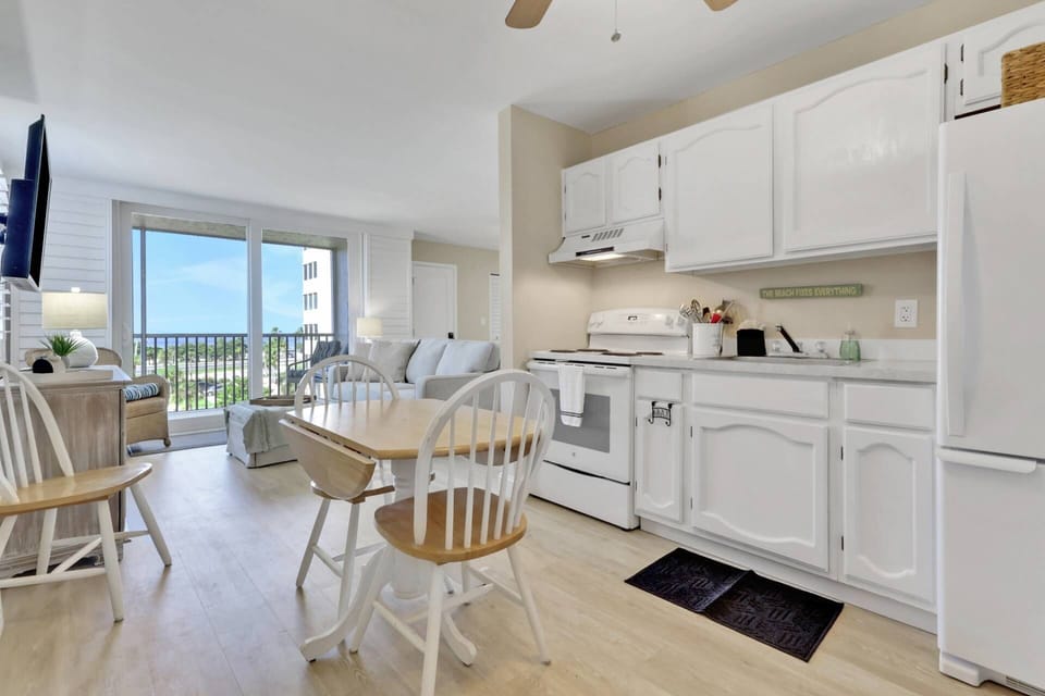 The eat-in kitchen has a dining table with seating for up to 4.