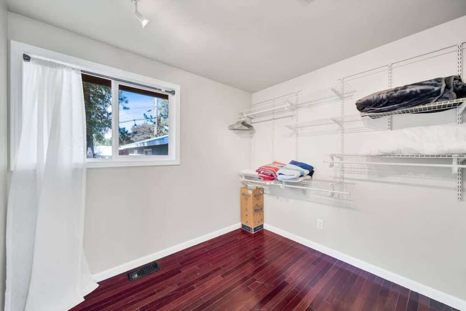 large walk in closet in master bedroom
