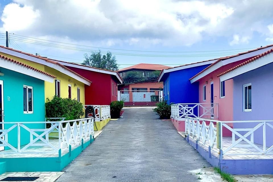 Colorful apartment complex, centrally located, near the airport and beach