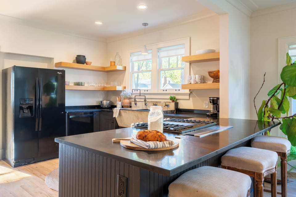 Modern kitchen with barstool seating.