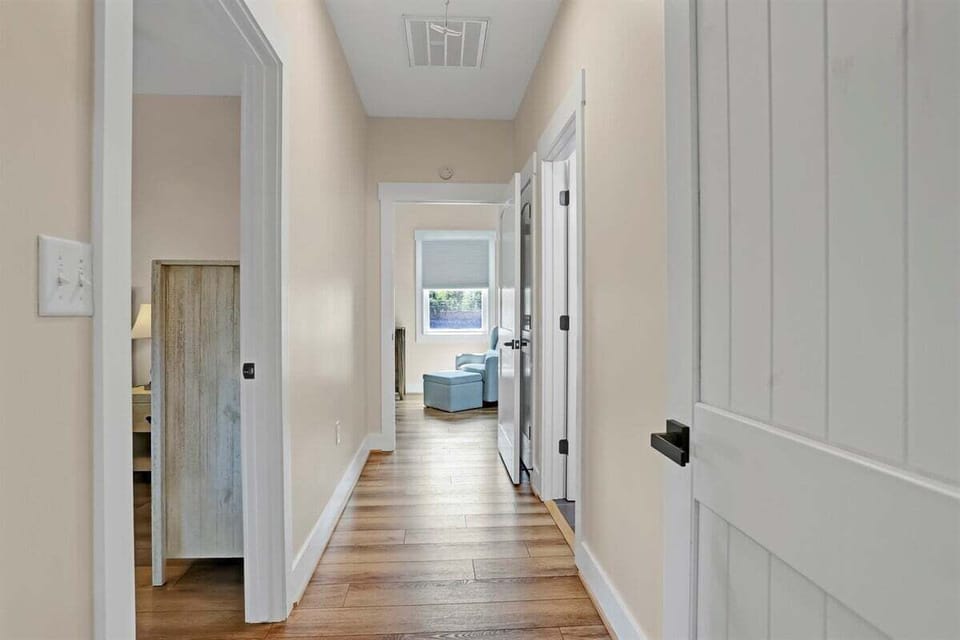 A central hallway seamlessly connects the home's living spaces.