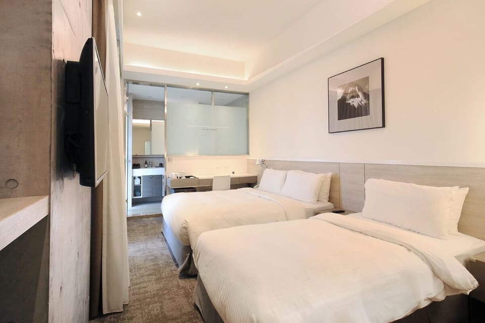 Triple Room (One Double & One Single Bed) | Down comforters, in-room safe, desk, blackout drapes